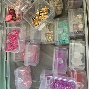 Over 24 containers of beads! Must see